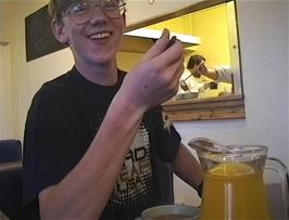 Oliver tastes the very good soup at Borth youth hostel